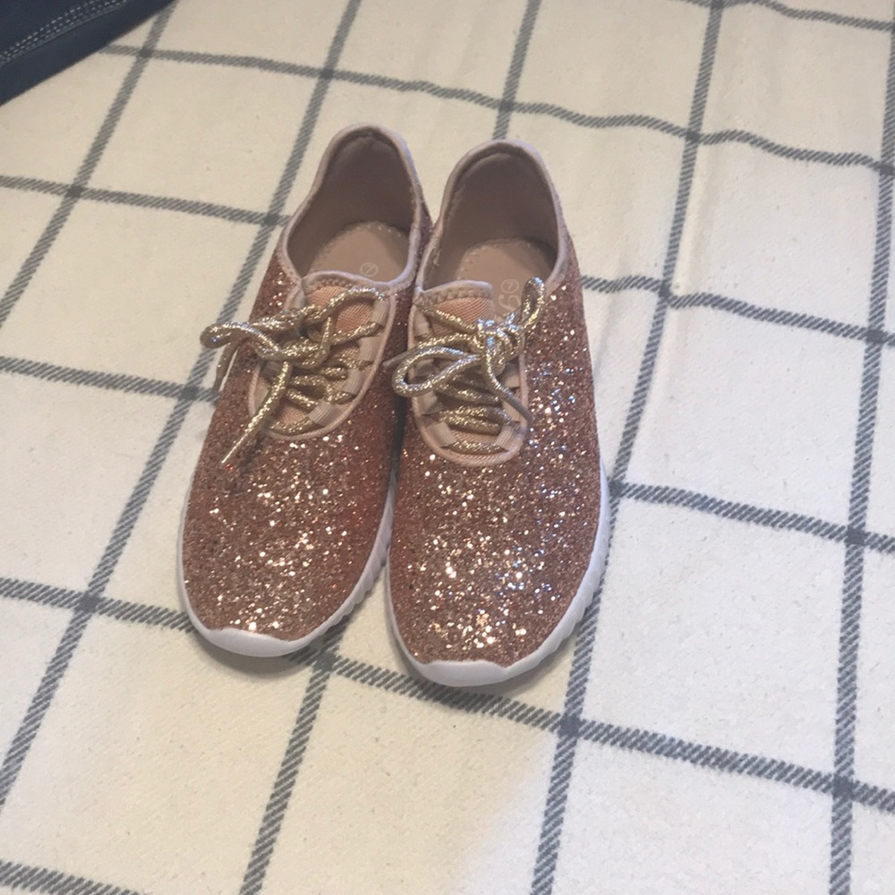 Rose gold shoes.